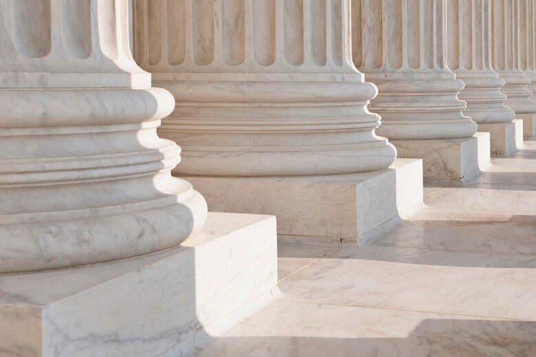 a group of white pillars