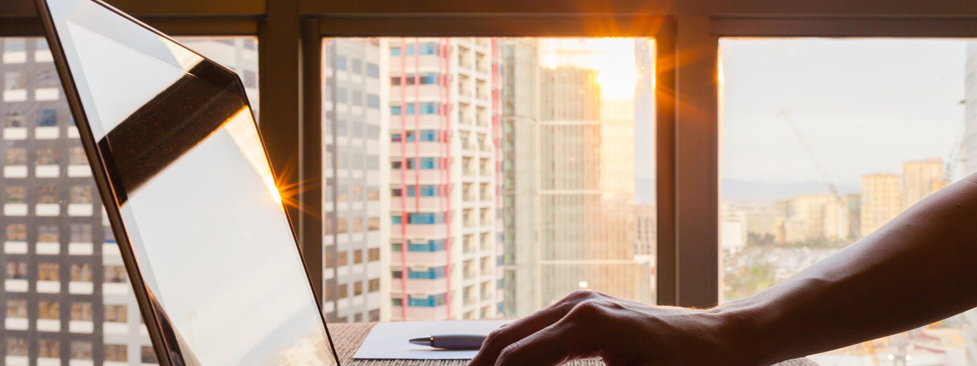 hand on a laptop