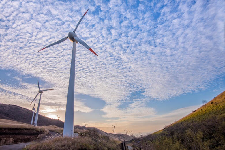 a group of wind turbines