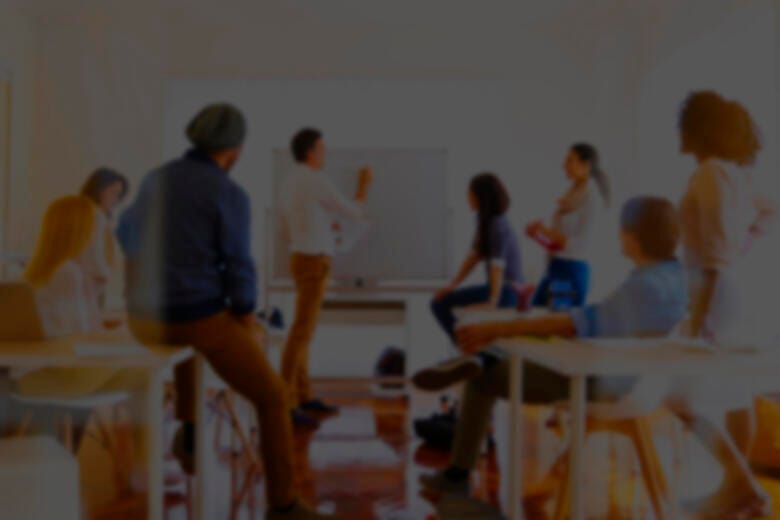 a group of people in a classroom