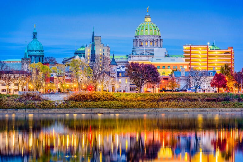 a body of water with buildings along it