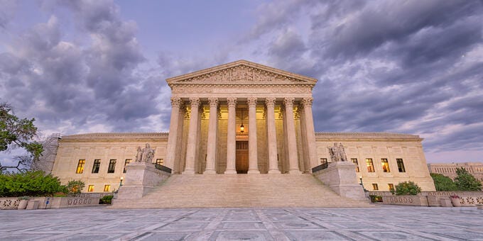 a building with columns and a dome